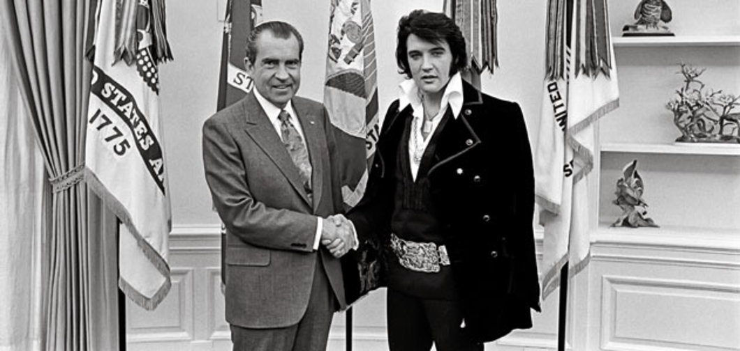 Nixon gives Elvis honorary DEA badge. 